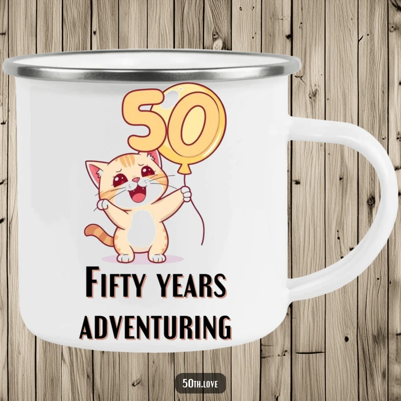 Funny 'Cat 50th Birthday' Camping Mug: A mischievous cat bats at a golden number 50 balloon, perfect for outdoor fun.