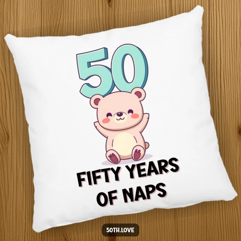 Funny 50th birthday pillow with a happy bear balancing the number 50 on its head, offering comfort and humor.