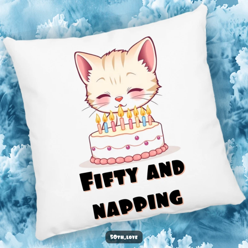 Funny 50th birthday pillow with a smiling kitten trying to blow out fifty tiny candles on a small cake, adding humorous comfort.