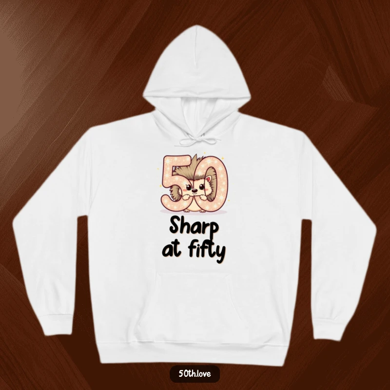 Funny hoodie showcasing a chubby hedgehog peeking from behind a large, sparkling number 50, ideal for a birthday.