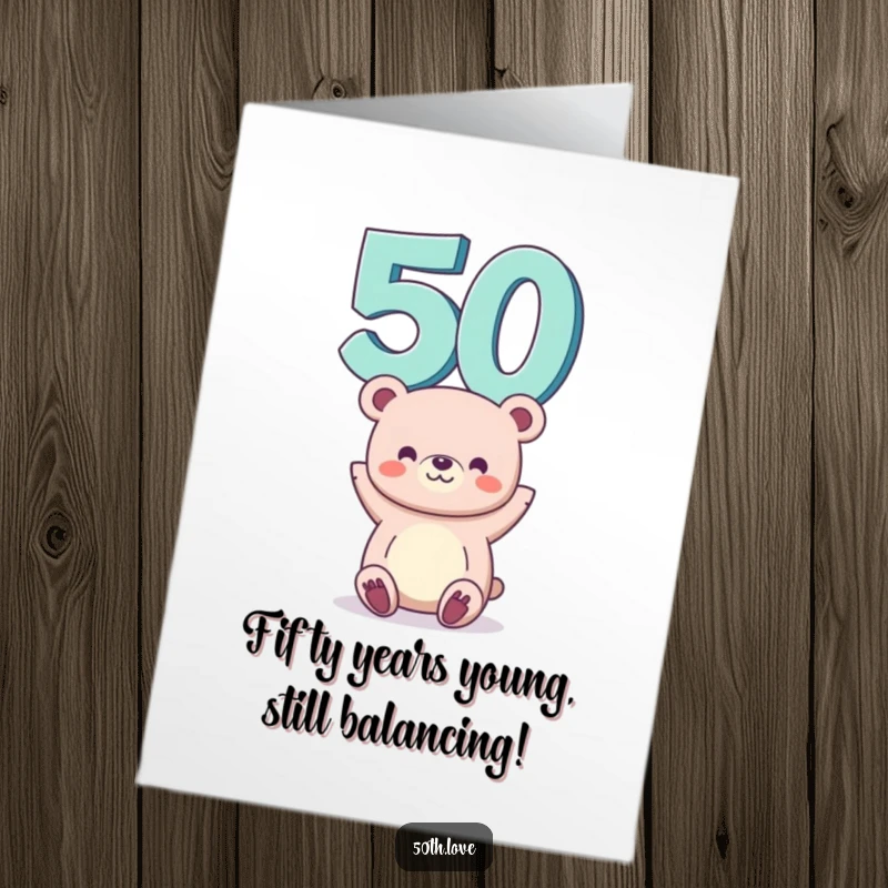 Funny Free Printable 50th Birthday Card featuring a smiling bear precariously balancing a giant number 50 on its head.