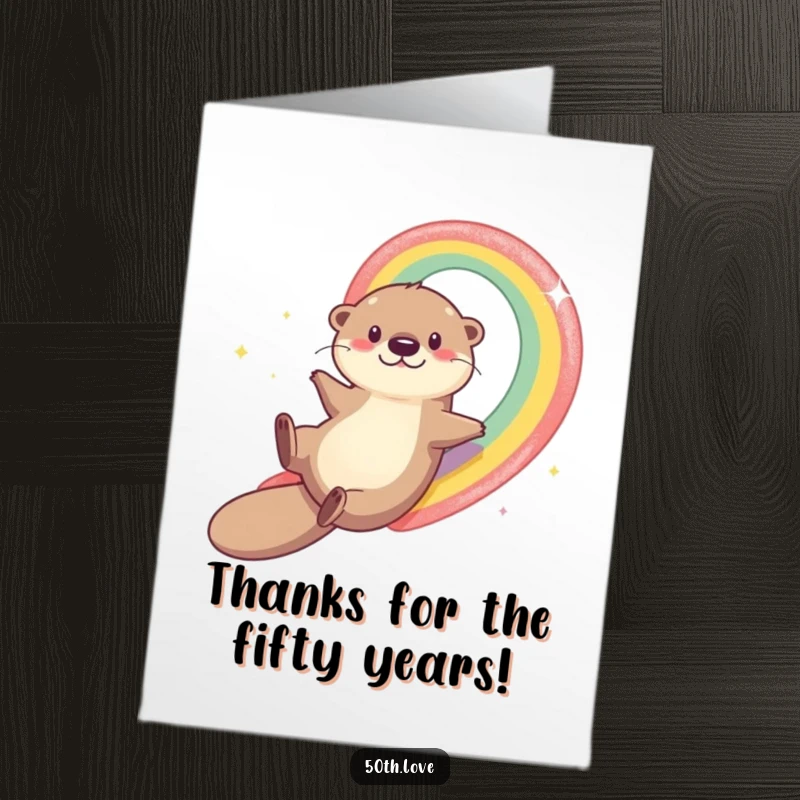 Funny Free Printable Thank You Card: A cheerful otter gracefully slides down a rainbow, expressing thanks.