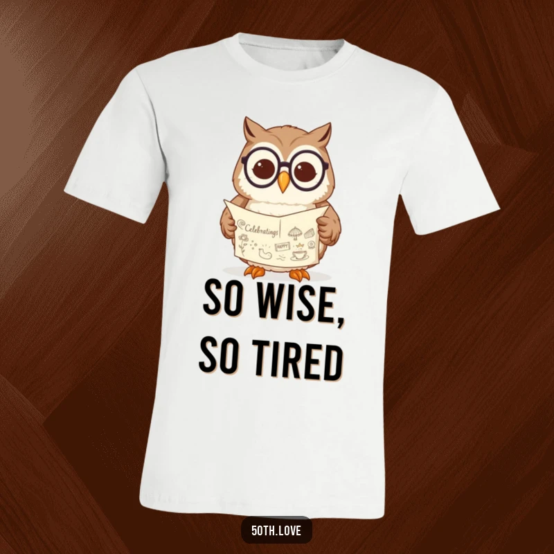 Funny t-shirt featuring a content owl wearing spectacles, absorbed in reading a scroll adorned with celebratory doodles.